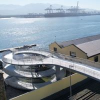 Filigree steel structure connects new and old districts in Brazilian city logo 