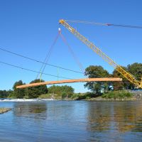 Timber bridge craned into position between Austria and Slovenia logo 