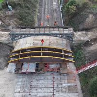 Successful lift of historic cast-iron bridge logo 