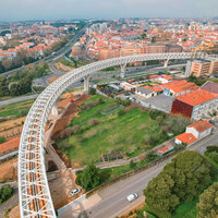 Curved viaduct completes light rail project in Portugal logo 
