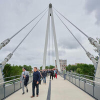 Active travel bridge will help French city reclaim river banks logo 